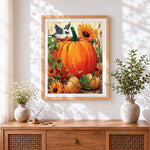 Finished pumpkin, sunflowers and bird cross stitch artwork displayed