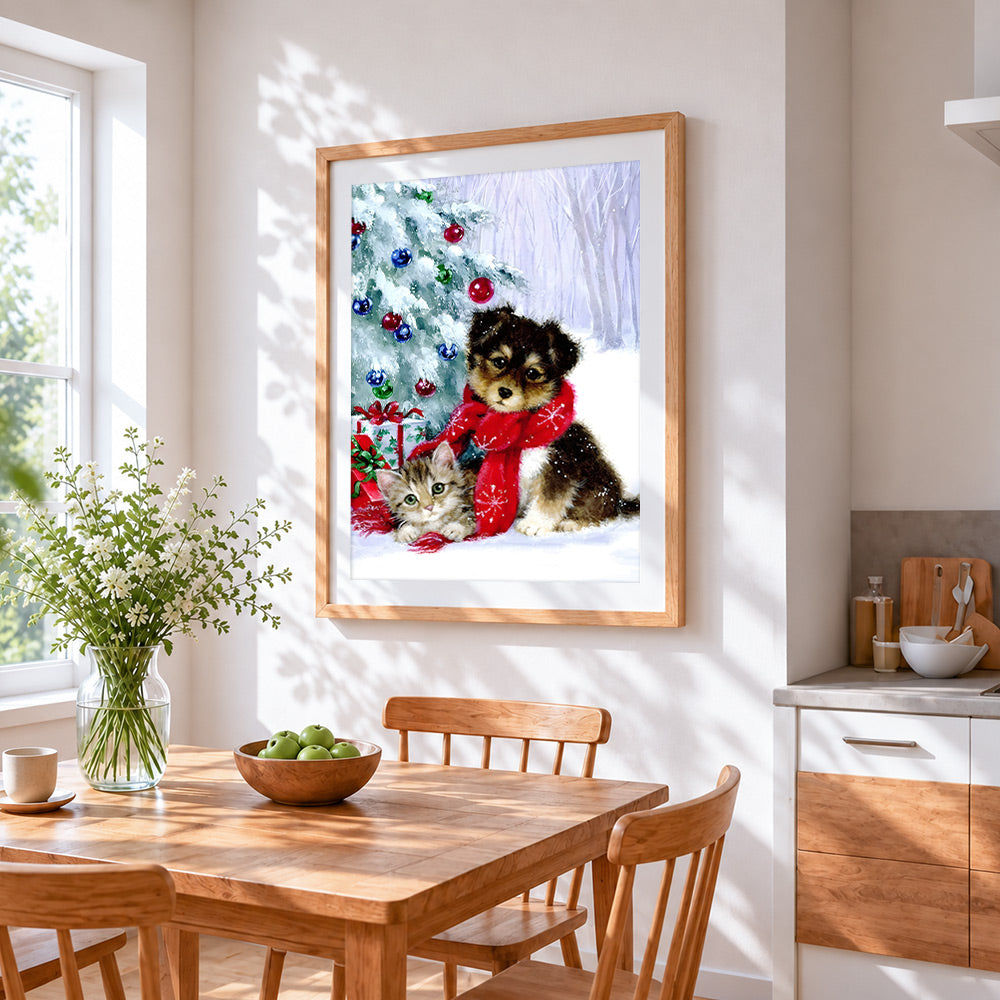 Puppy and kitten by a snowy christmas tree cross stitch artwork displayed on wall as home decor