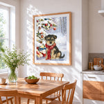Puppy in red scarf by a snowy christmas tree cross stitch artwork displayed on wall as home decor