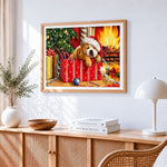 Puppy sleeping in a gift box cross stitch artwork displayed on wall as home decor