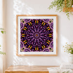 Finished purple and gold kaleidoscope mandala cross stitch artwork displayed