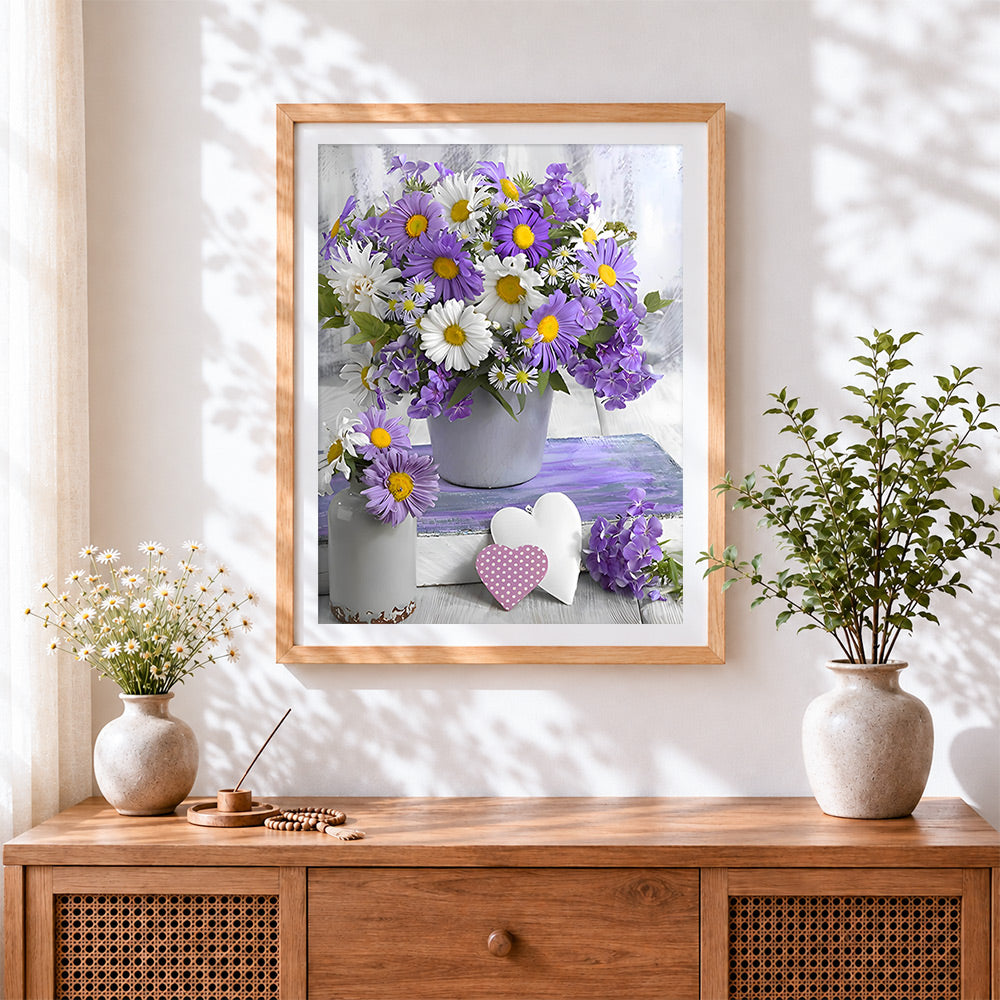 Finished purple and white daisies still life cross stitch artwork displayed