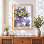 Finished purple and white daisies still life cross stitch artwork displayed