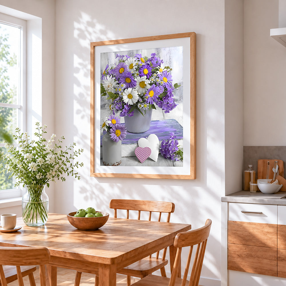 Purple and white daisies still life cross stitch artwork displayed on wall as home decor