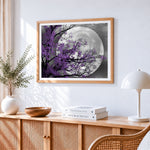 Purple blossom tree and full moon paint by numbers artwork displayed on wall as home decor