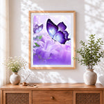 Finished purple butterfly on lily flower cross stitch artwork displayed
