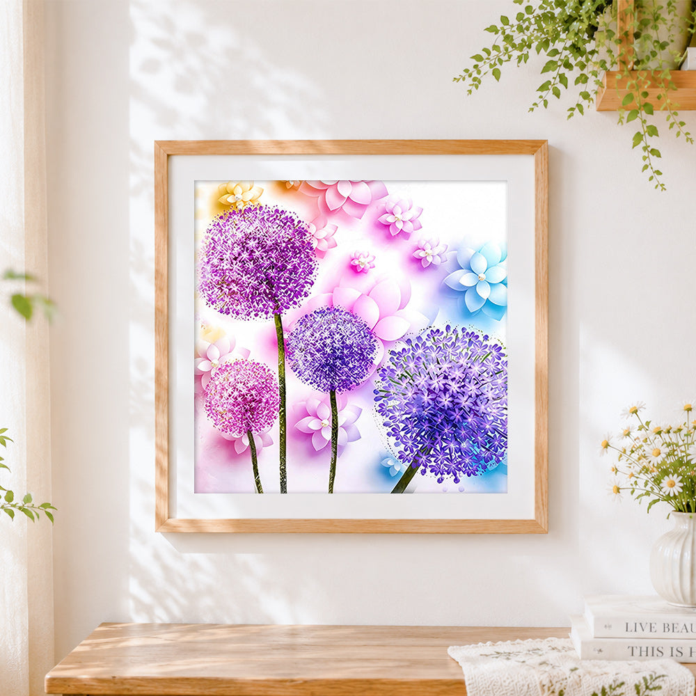 Finished purple dandelion and paper blossoms cross stitch artwork displayed