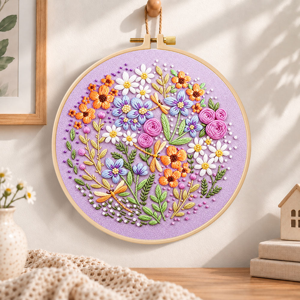 Purple floral circle with dragonflies embroidery hoop wall art displayed as warm and cosy handmade home decor