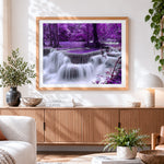 Finished purple forest waterfall cross stitch artwork displayed