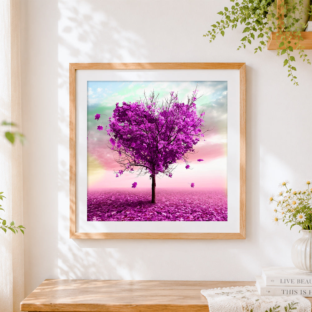 Finished purple heart-shaped tree cross stitch artwork displayed