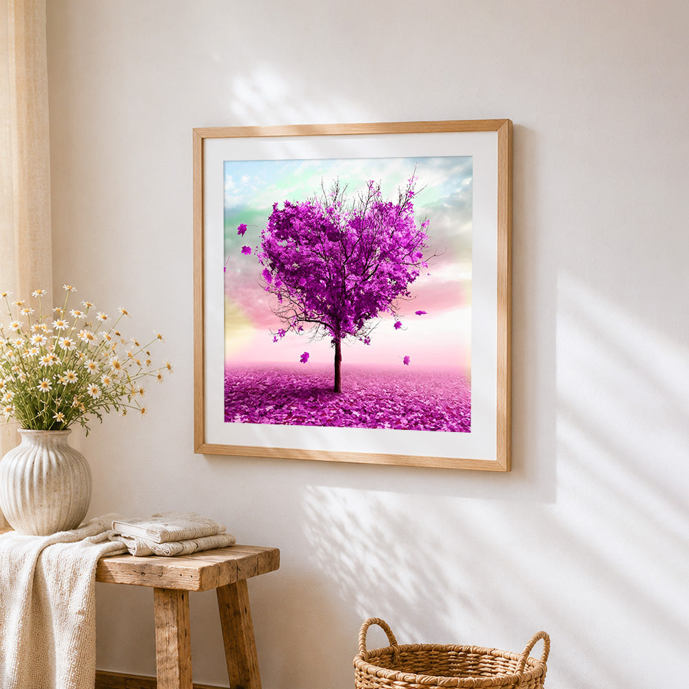 Purple heart-shaped tree cross stitch artwork displayed on wall as home decor
