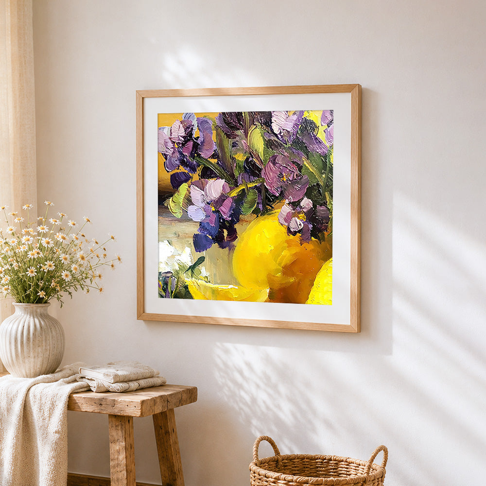 Purple irises and lemons cross stitch artwork displayed on wall as home decor