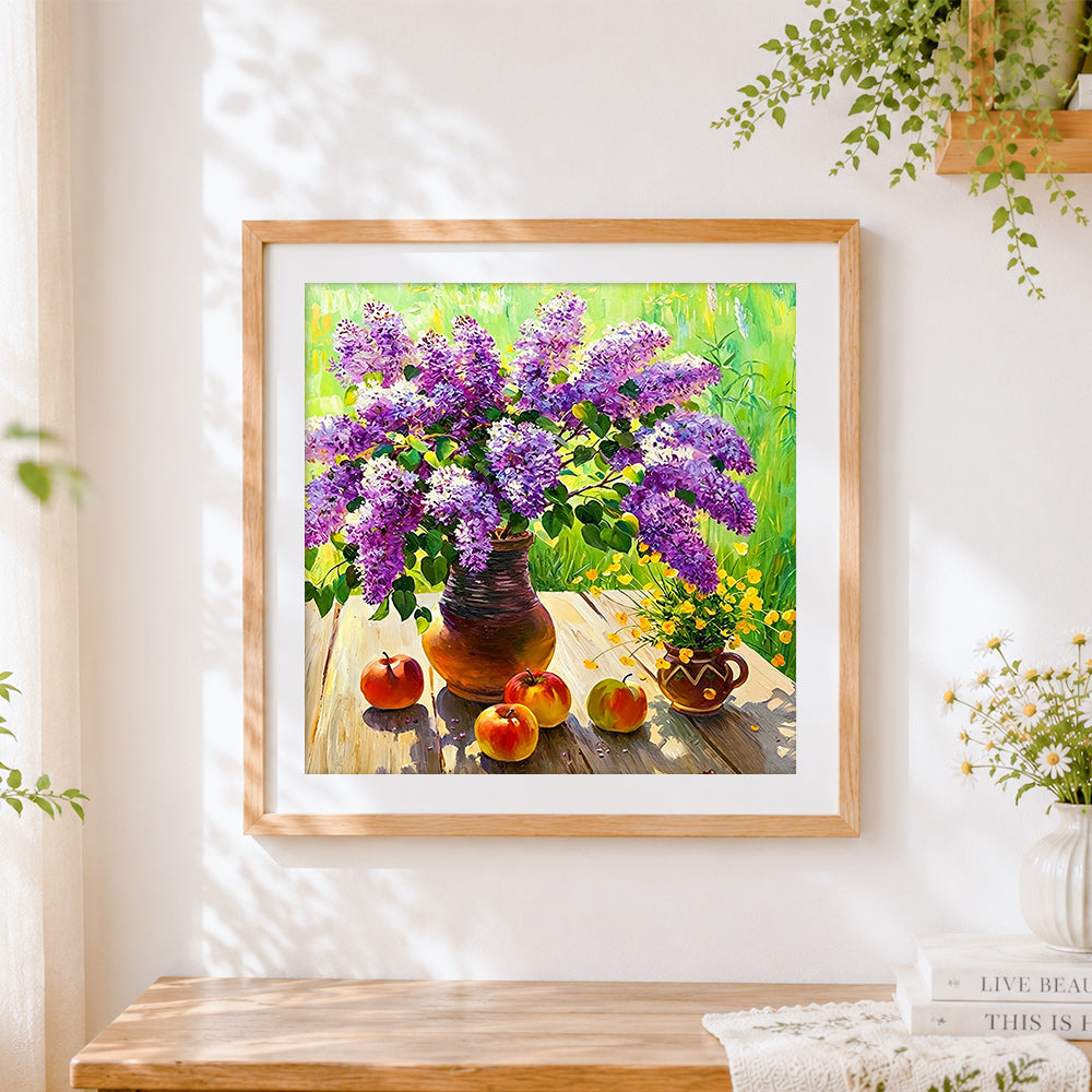 Finished purple lilacs and apples still life cross stitch artwork displayed