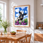 Purple lilacs, heart-shaped clouds and a cow cross stitch artwork displayed on wall as home decor