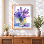 Finished purple lilacs in a jar cross stitch artwork displayed