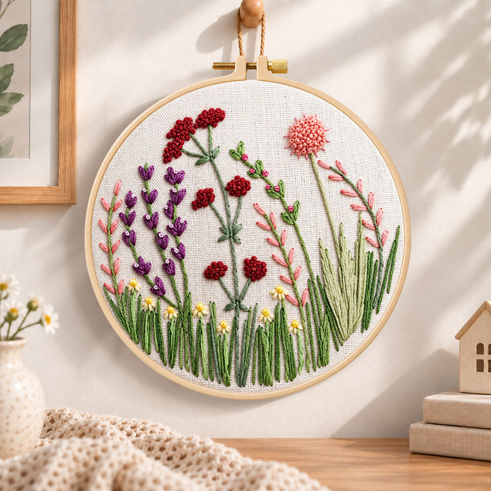Purple meadow flowers embroidery hoop wall art displayed as warm and cosy handmade home decor