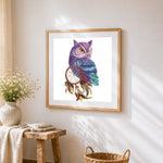 Purple owl with dreamcatcher cross stitch artwork displayed on wall as home decor