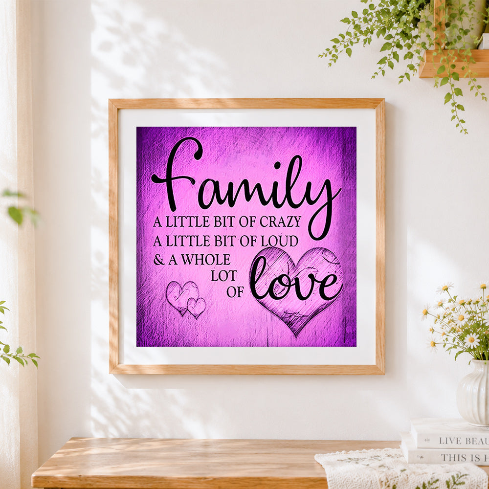 Finished purple texture family quote cross stitch artwork displayed
