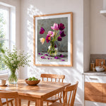 Purple tulips in a glass vase cross stitch artwork displayed on wall as home decor