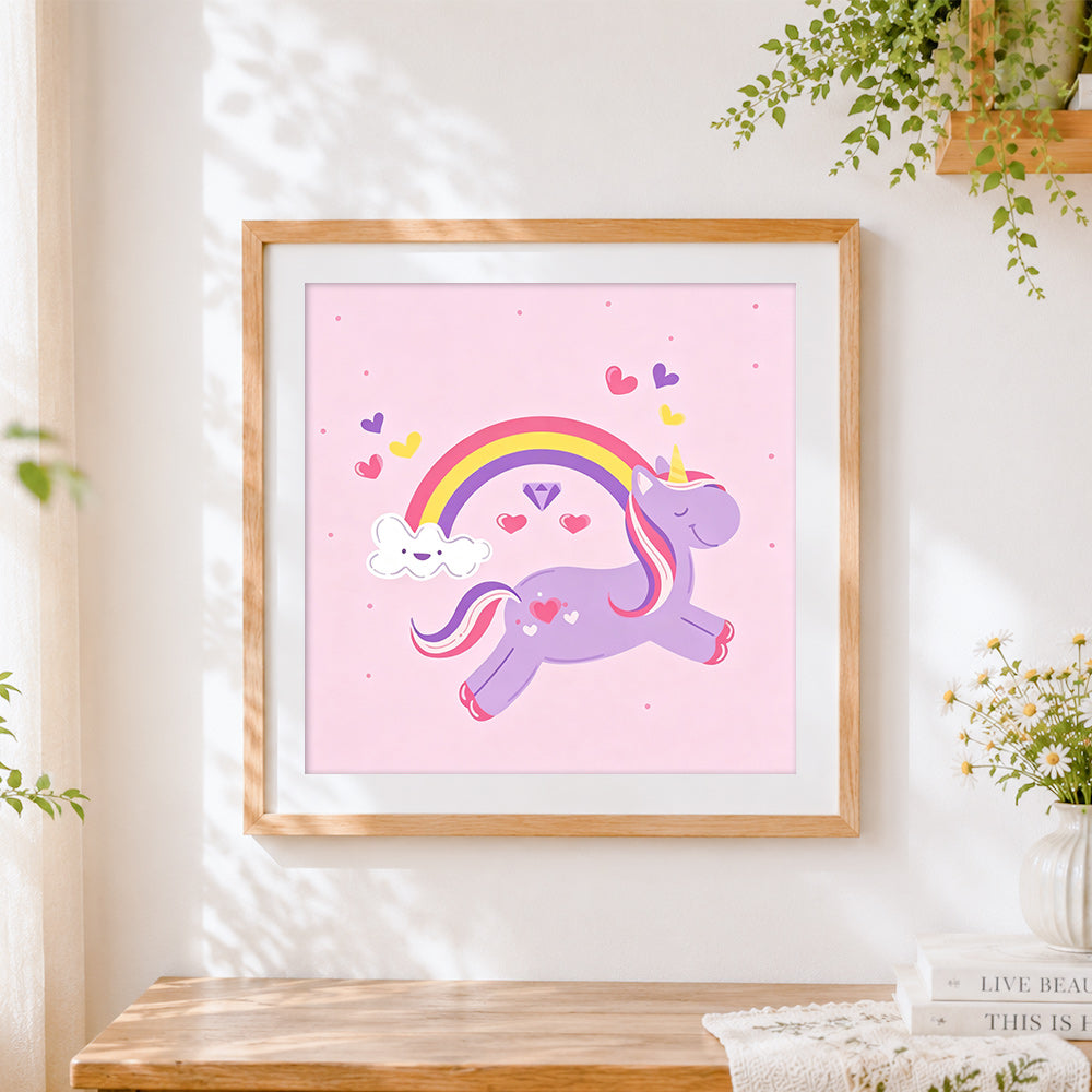 Finished purple unicorn jumping over a rainbow cross stitch artwork displayed