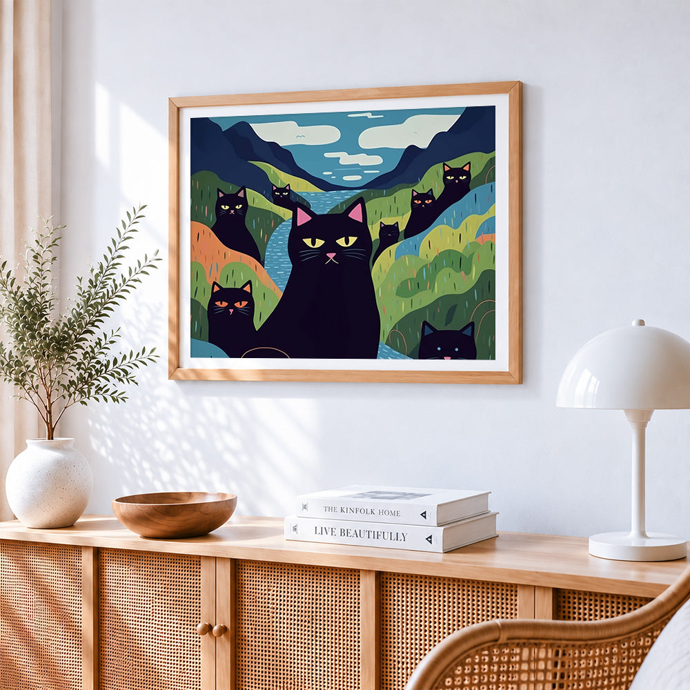 Quirky black cats in a colourful valley paint by numbers artwork displayed on wall as home decor