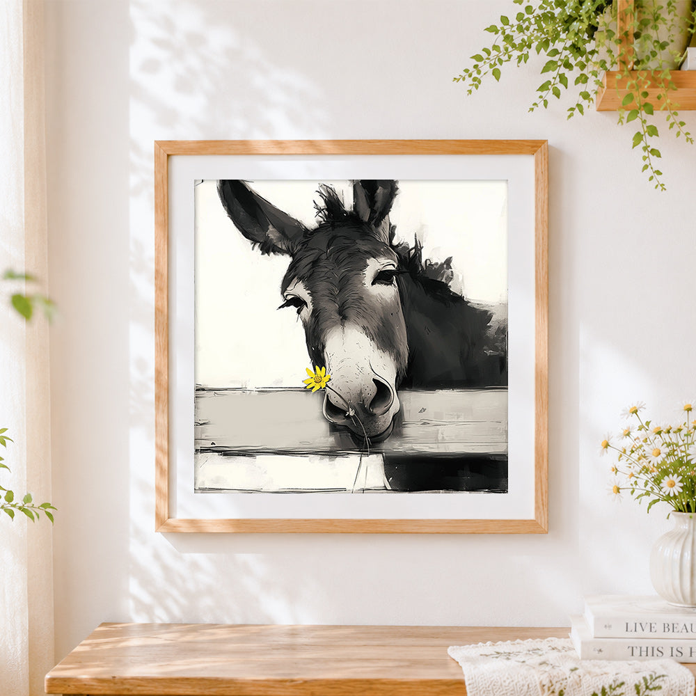 Finished quirky donkey with a yellow flower cross stitch artwork displayed