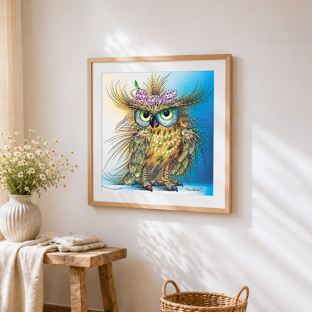 Quirky owl with butterfly and pearls cross stitch artwork displayed on wall as home decor