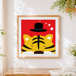 Finished quirky tiger with top hat cross stitch artwork displayed
