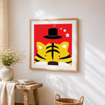 Quirky tiger with top hat cross stitch artwork displayed on wall as home decor