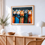 Quirky vintage cats in colourful scarves cross stitch artwork displayed on wall as home decor