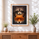 Finished raccoon and fox cross stitch artwork displayed