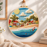 Radiant coastal hamlet embroidery hoop wall art displayed as warm and cosy handmade home decor