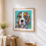 Rainbow beagle portrait cross stitch artwork displayed on wall as home decor