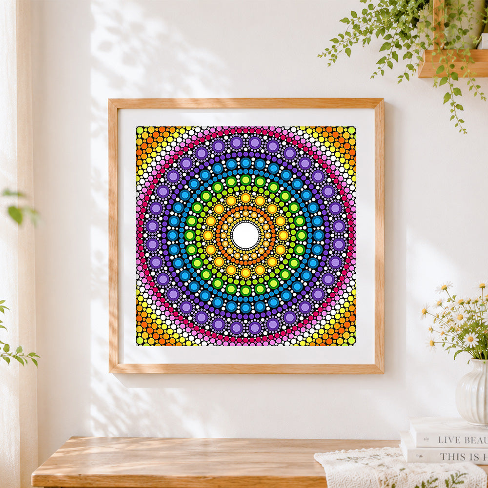 Finished rainbow dot mandala with white centre cross stitch artwork displayed