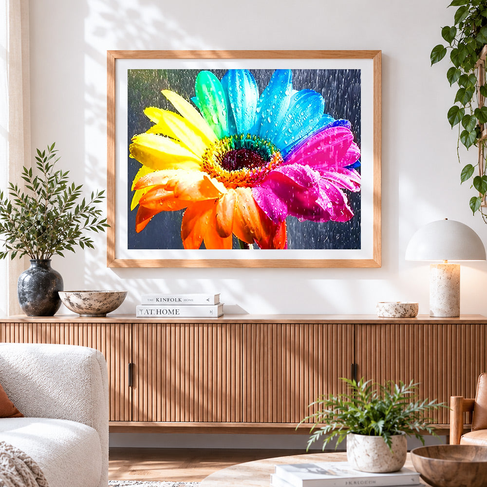 Finished rainbow gerbera daisy with water droplets paint by numbers artwork displayed as home decor