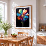 Rainbow glass flower cross stitch artwork displayed on wall as home decor