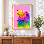 Finished rainbow lion looking up cross stitch artwork displayed