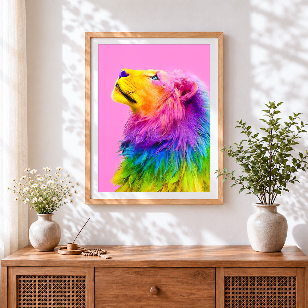 Finished rainbow lion looking up cross stitch artwork displayed