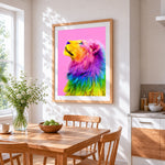 Rainbow lion looking up cross stitch artwork displayed on wall as home decor