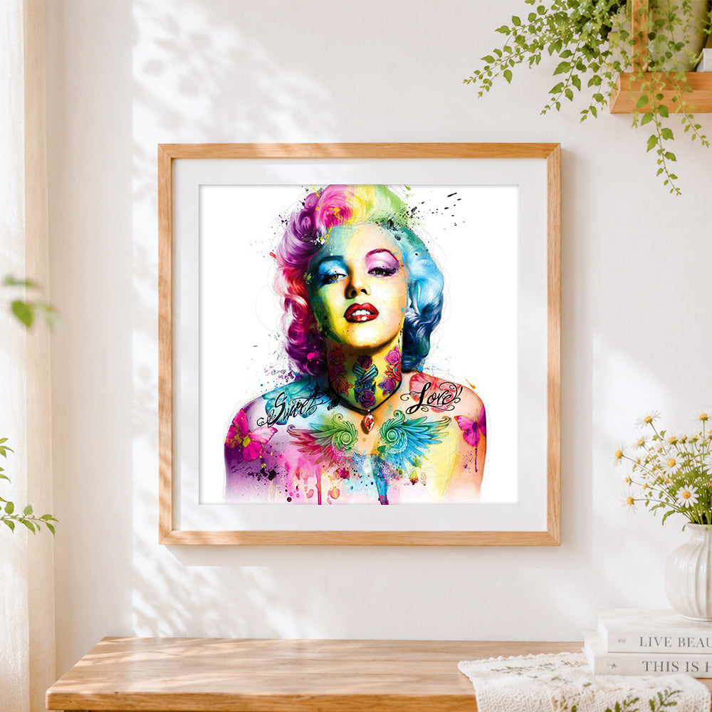 Finished rainbow marilyn monroe portrait cross stitch artwork displayed