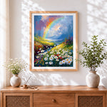 Finished rainbow over a daisy field cross stitch artwork displayed