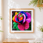 Finished rainbow rose with water droplets paint by numbers artwork displayed as home decor