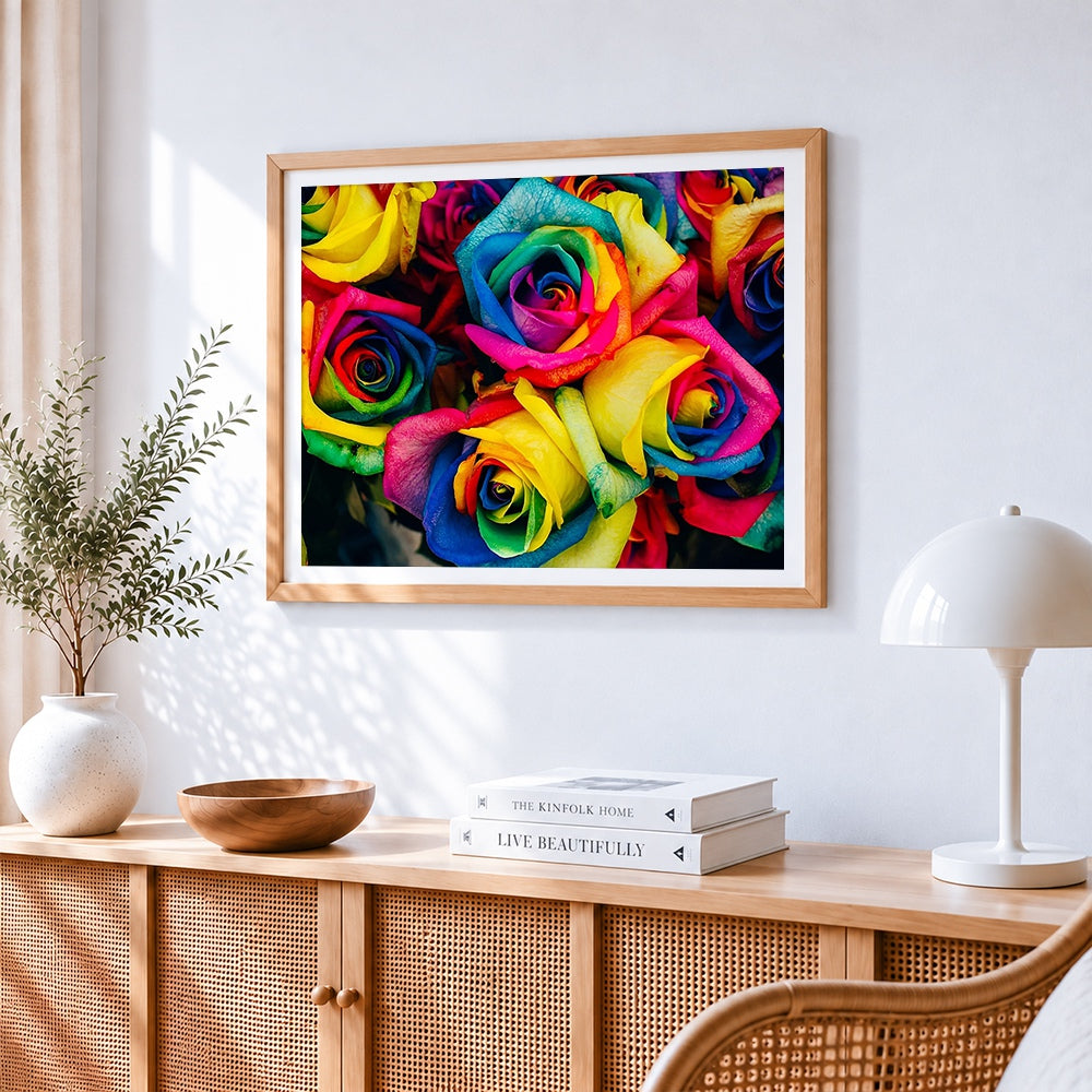 Rainbow roses bouquet cross stitch artwork displayed on wall as home decor