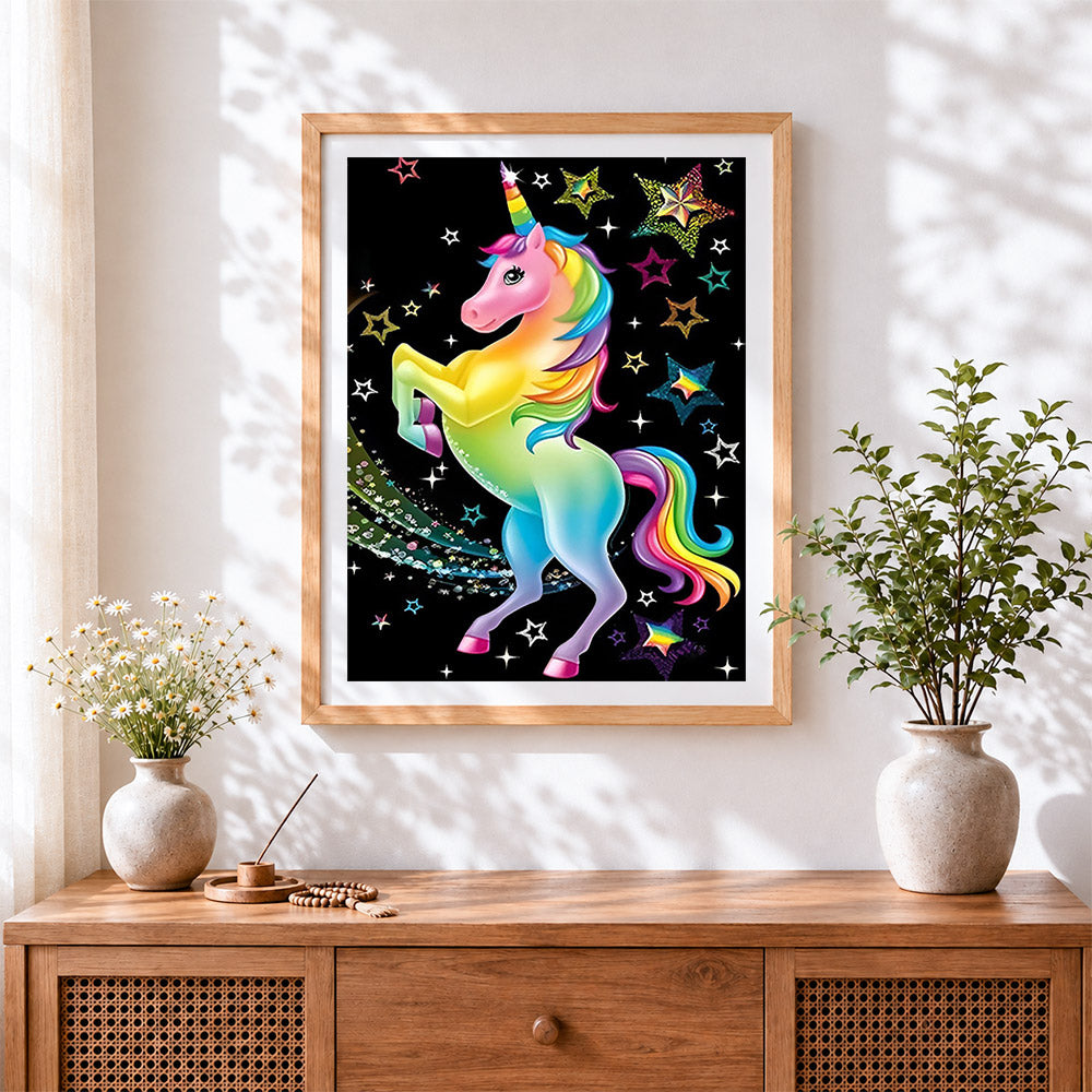 Finished rainbow unicorn and glitter stars cross stitch artwork displayed