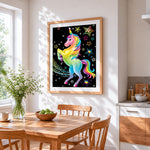 Rainbow unicorn and glitter stars cross stitch artwork displayed on wall as home decor