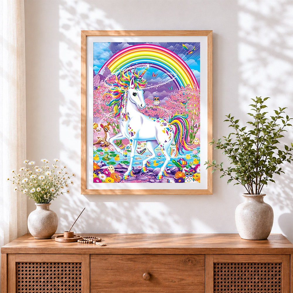 Finished rainbow unicorn in an enchanted forest cross stitch artwork displayed