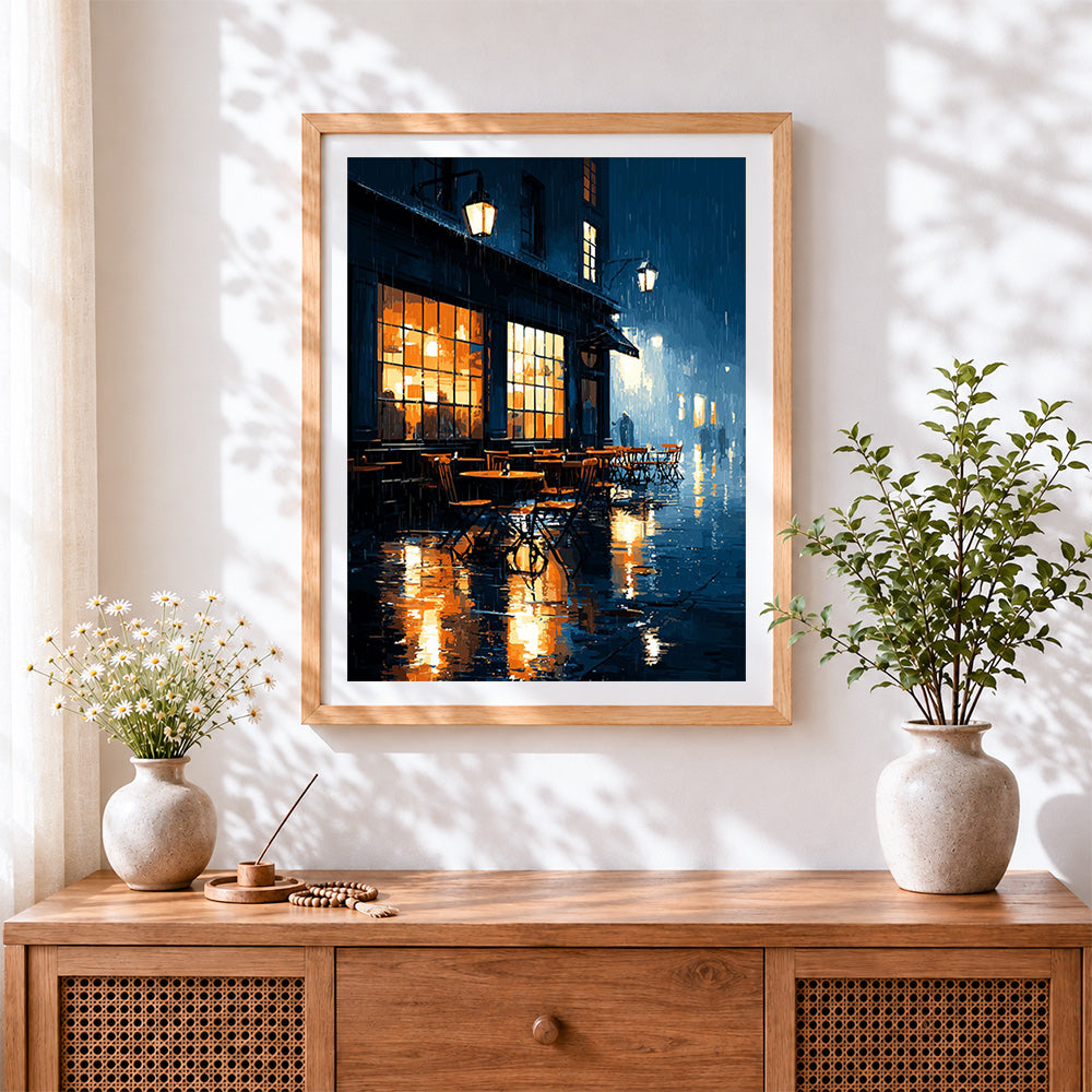 Finished rainy night cafe cross stitch artwork displayed
