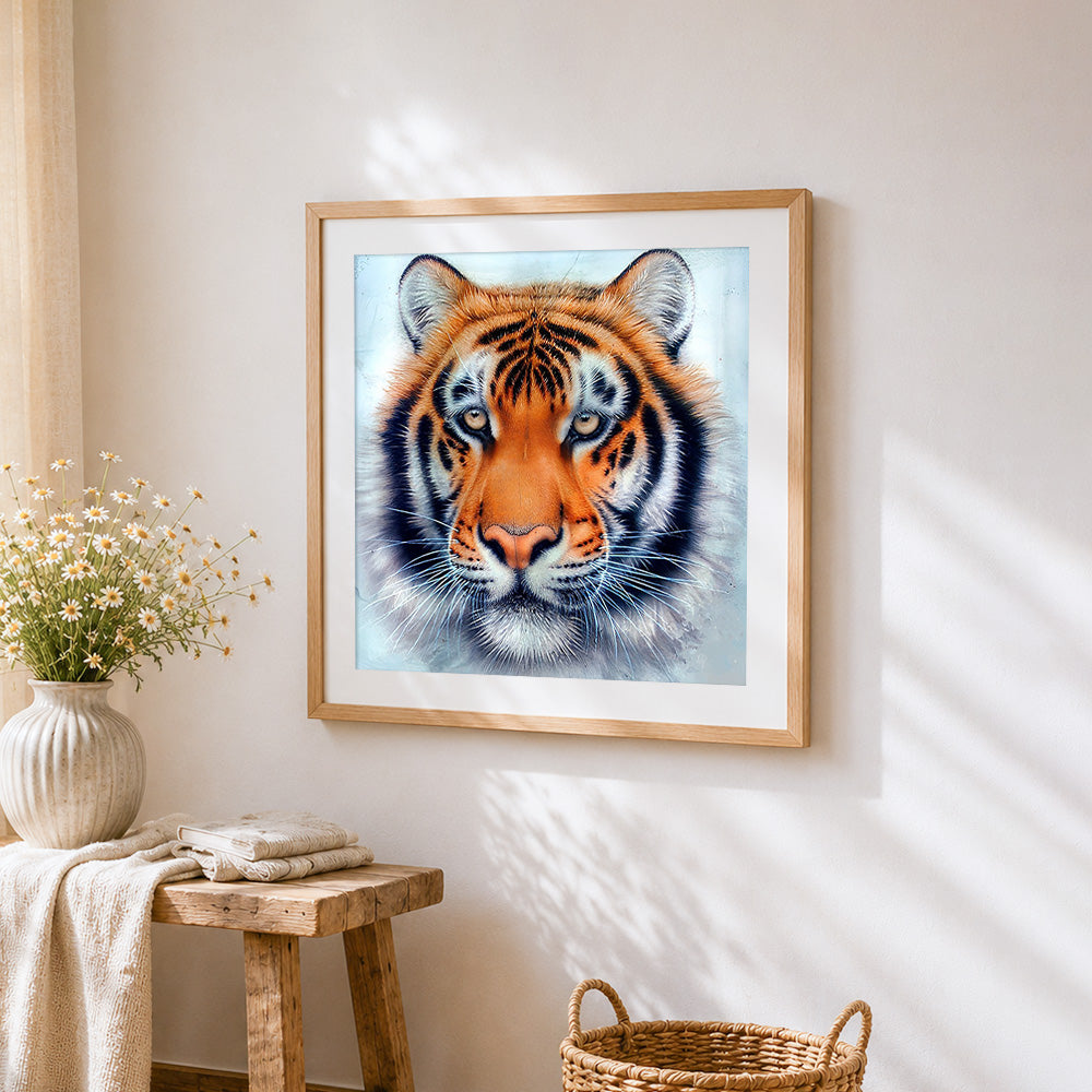 Realistic bengal tiger face close-up cross stitch artwork displayed on wall as home decor
