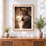 Finished realistic brown wolf portrait cross stitch artwork displayed