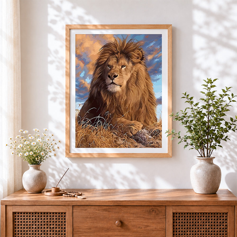 Finished realistic lion cross stitch artwork displayed